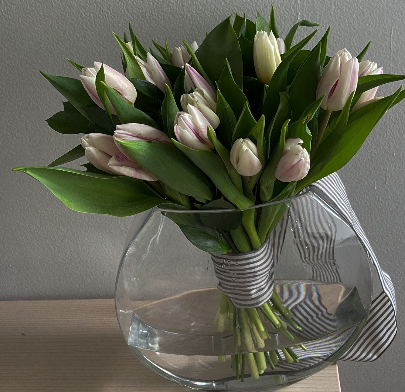 Classy Tulips bouquet in a signature vase