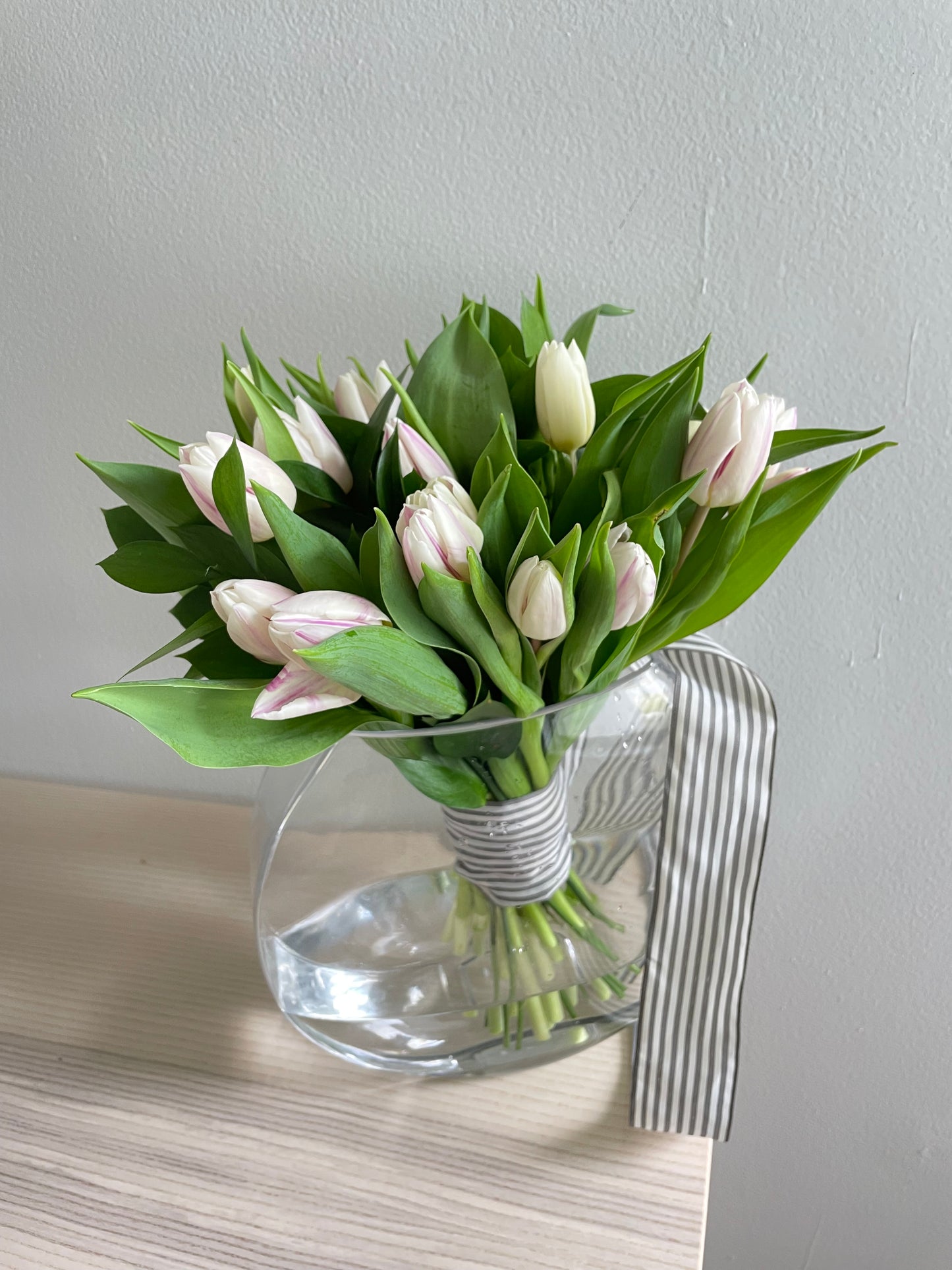 Classy Tulips bouquet in a signature vase