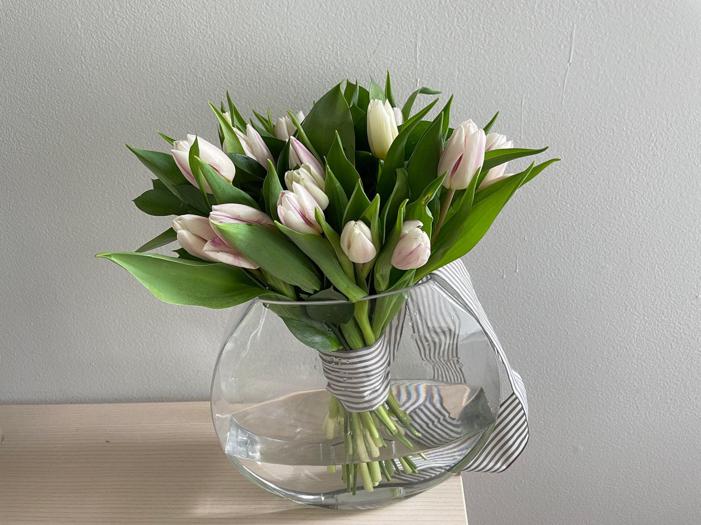 Classy Tulips bouquet in a signature vase