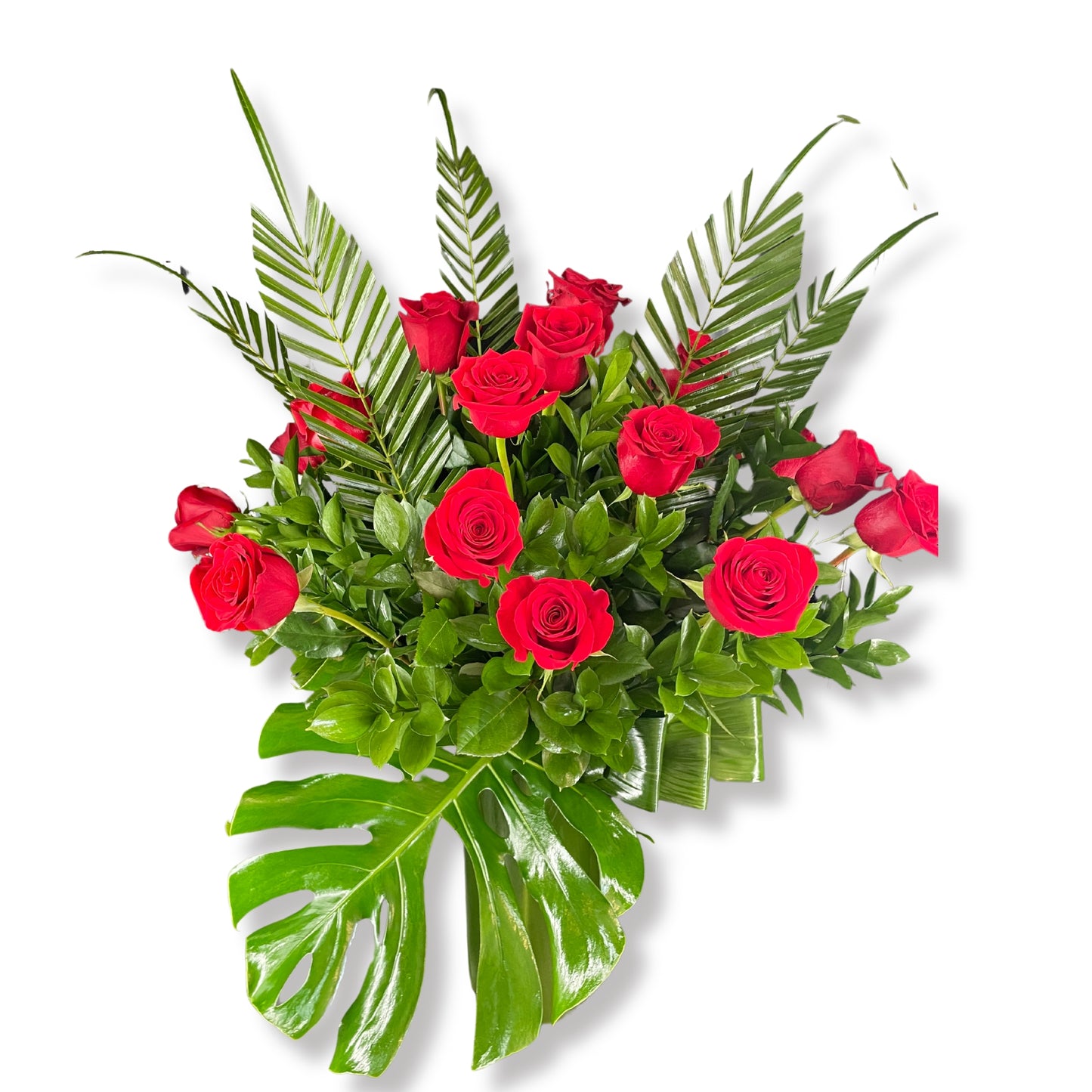 Tropical Dozen Red roses in a vase