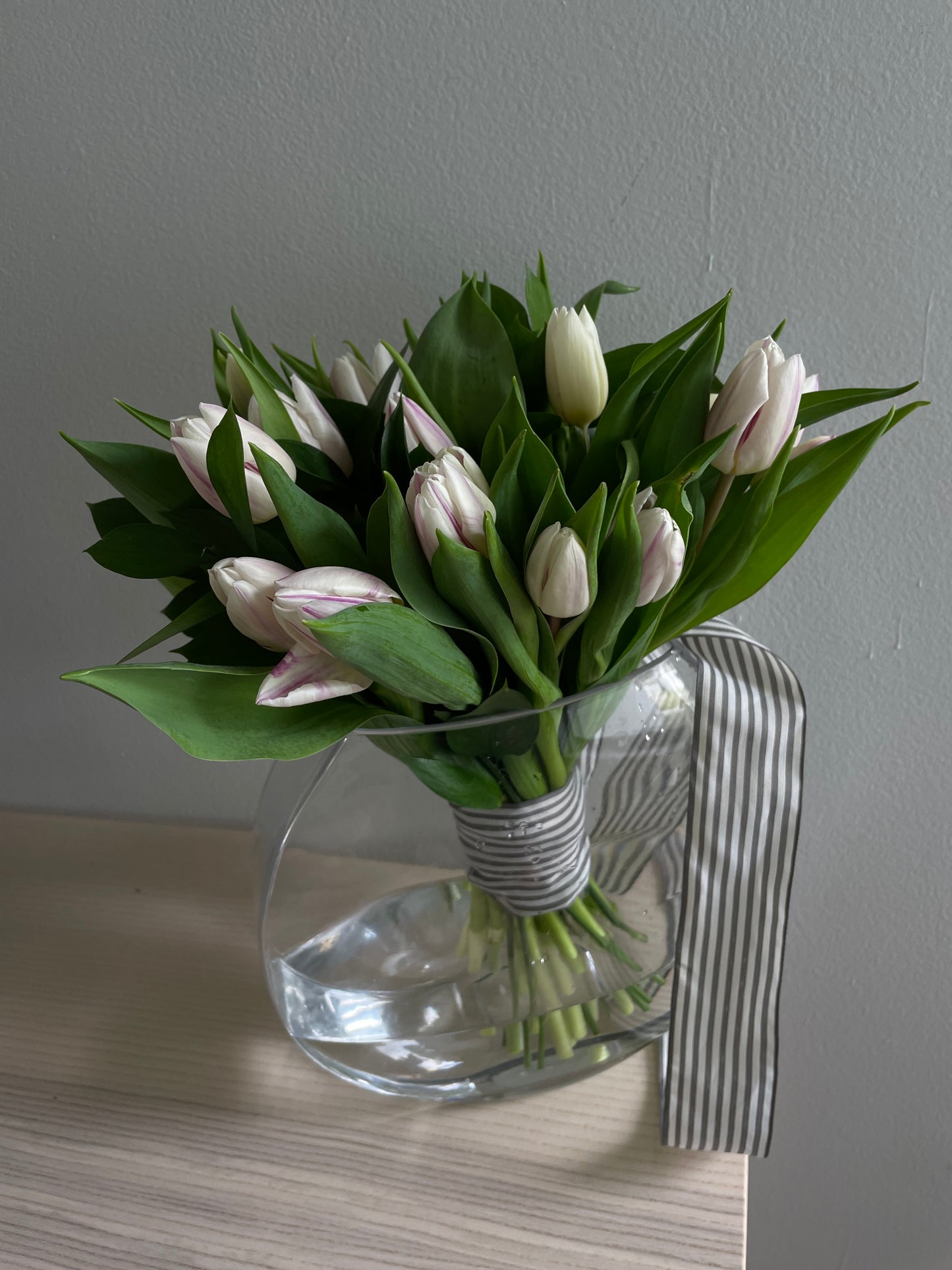 Classy Tulips bouquet in a signature vase