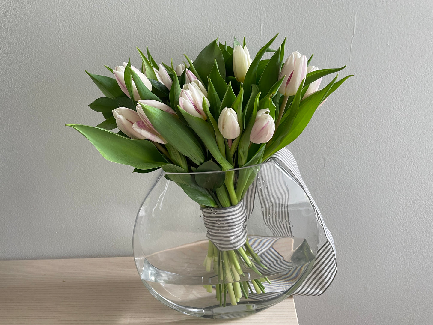 Classy Tulips bouquet in a signature vase